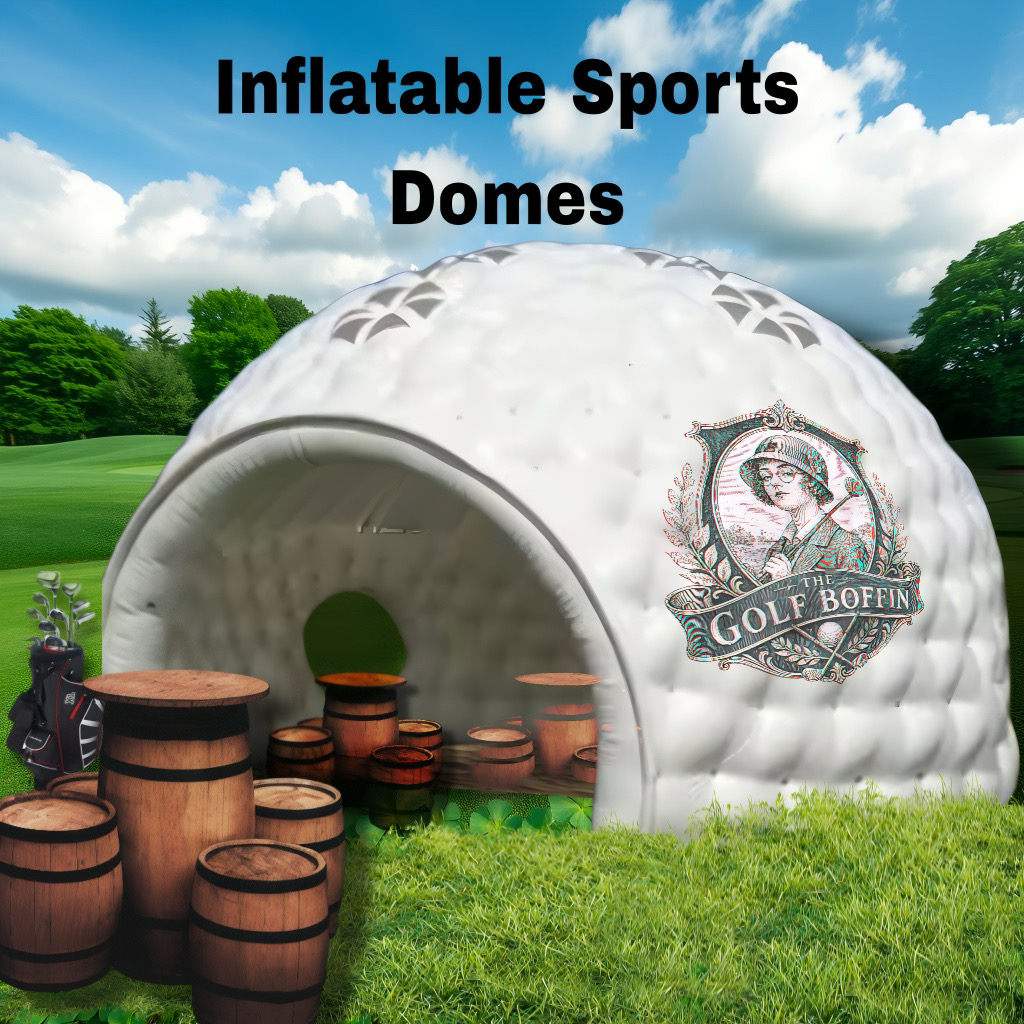 Branded white inflatable sports dome on a golf course with barrel tables outside